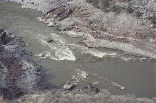 BC Archives # A-06133: Natives on fishing rocks at Six Mile Rapids